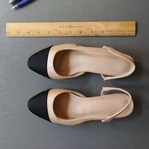 Beige and black slingbacks